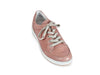 pale pink pearlised leather trainers with soft laces and white and brown rubber sole.