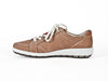 taupe leather trainers with white and brown rubber sole and bright red ends to the laces.