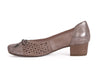 side of ladies court shoe with punched suede sides and top, with a contrasting texture patent leather heel and toe, in go-with-everything taupe