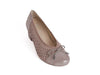 top view of ladies court shoe with punched suede sides and top, with a contrasting texture patent leather heel and toe, in go-with-everything taupe