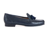 Smart navy blue leather ladies loafer with black suede tassel on the top and the feature stitching detail of a moccasin shoe. 