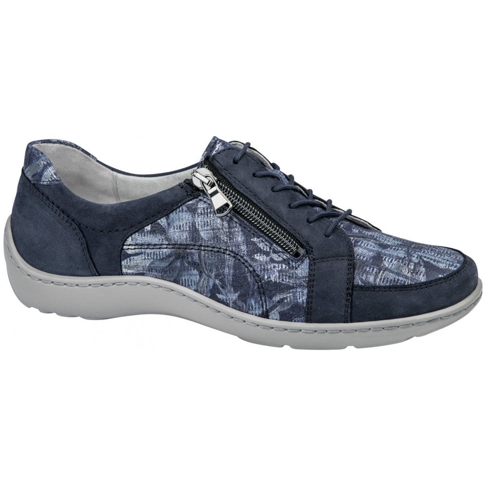 navy blue leather trainer shoe with floral panels and light grey sole