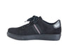 Black flat-soled ladies’ trainer shoe with mesh and leather upper, stripe detail and wide laces. 