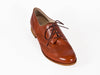 Overhead view of smart brown leather ladies brogue shoes with fine laces, flat heel and elegant punched leather detail