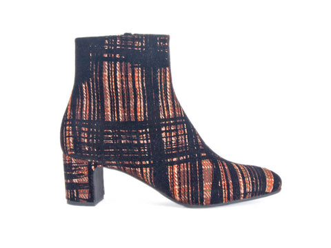 Ankle boot with heel in tartan fabric and leather