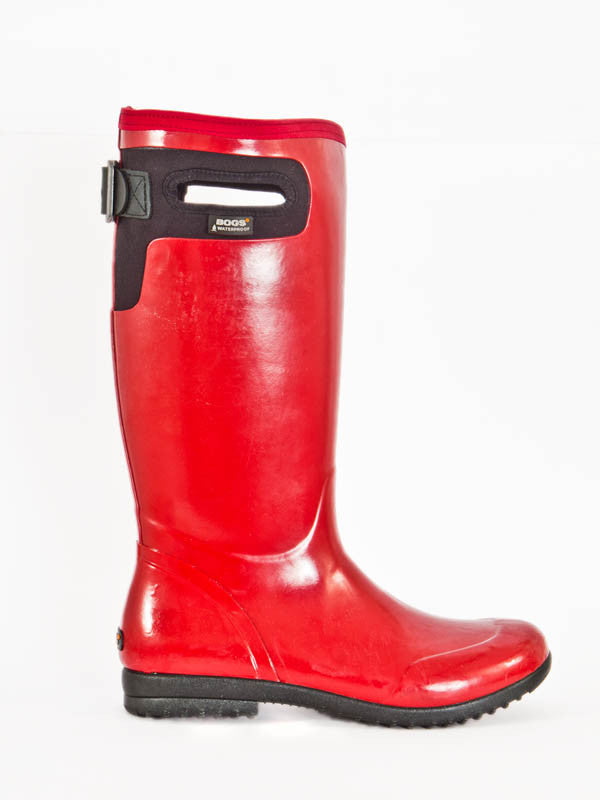 Bright red knee high wellies with black sole, heel and hand grips for easier pulling on and off