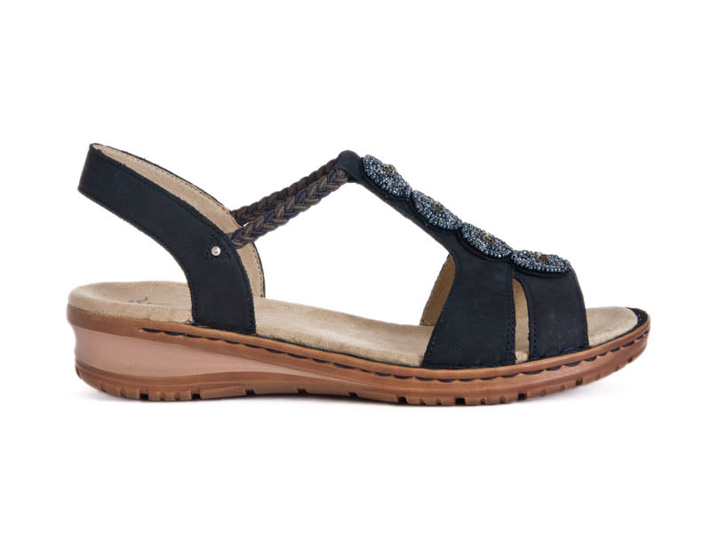 Navy blue sandal type shoe with back strap, open toes and four round bead decorations on the front. 