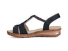 Navy blue sandal type shoe with back strap, open toes and four round bead decorations on the front. 