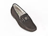 Ladies black leather moccasin shoe with decorative punched metal trim