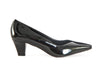 black grey mid-height heeled shoe with glossy patent leather on one side and rich suede on the other, overlapping on the front of the shoe