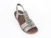 Metallic silver leather sandals with a backstrap, narrow plaited elastic side and pretty bead detail on the top of the foot. 