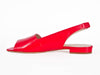 Red slingback sandal shoes, with flat heel. side view. 