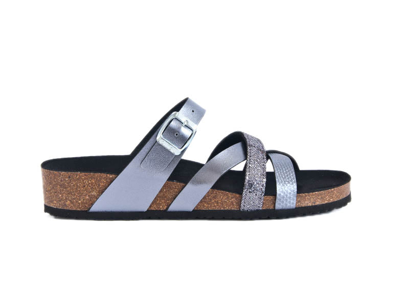 sandal with criss cross straps of soft silver leather, smooth and patterened, with black lining and comfy cork sole with hard-wearing black tread