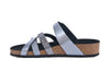 sandal with criss cross straps of soft silver leather, smooth and patterened, with black lining and comfy cork sole with hard-wearing black tread