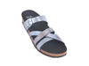 sandal with criss cross straps of soft silver leather, smooth and patterened, with black lining and comfy cork sole with hard-wearing black tread