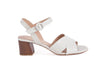 cream coloured women's sandals with mid-height heel, leather crossover top with matching leather toe, and pretty round side buckle