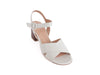 cream coloured women's sandals with mid-height heel, leather crossover top with matching leather toe, and pretty round side buckle